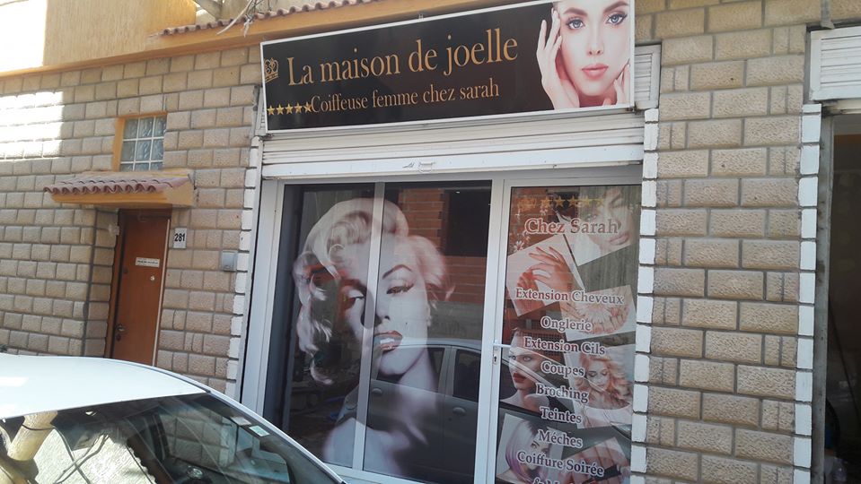 réalisation D'habillage et habillage vitrine one way vision salon de beauté sur Marrakech