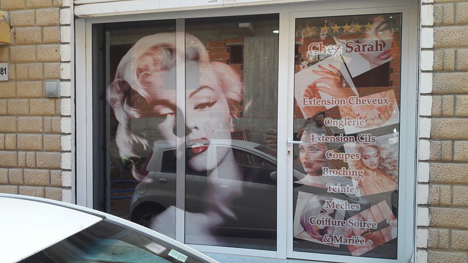 réalisation D'habillage et habillage vitrine one way vision salon de beauté sur Marrakech